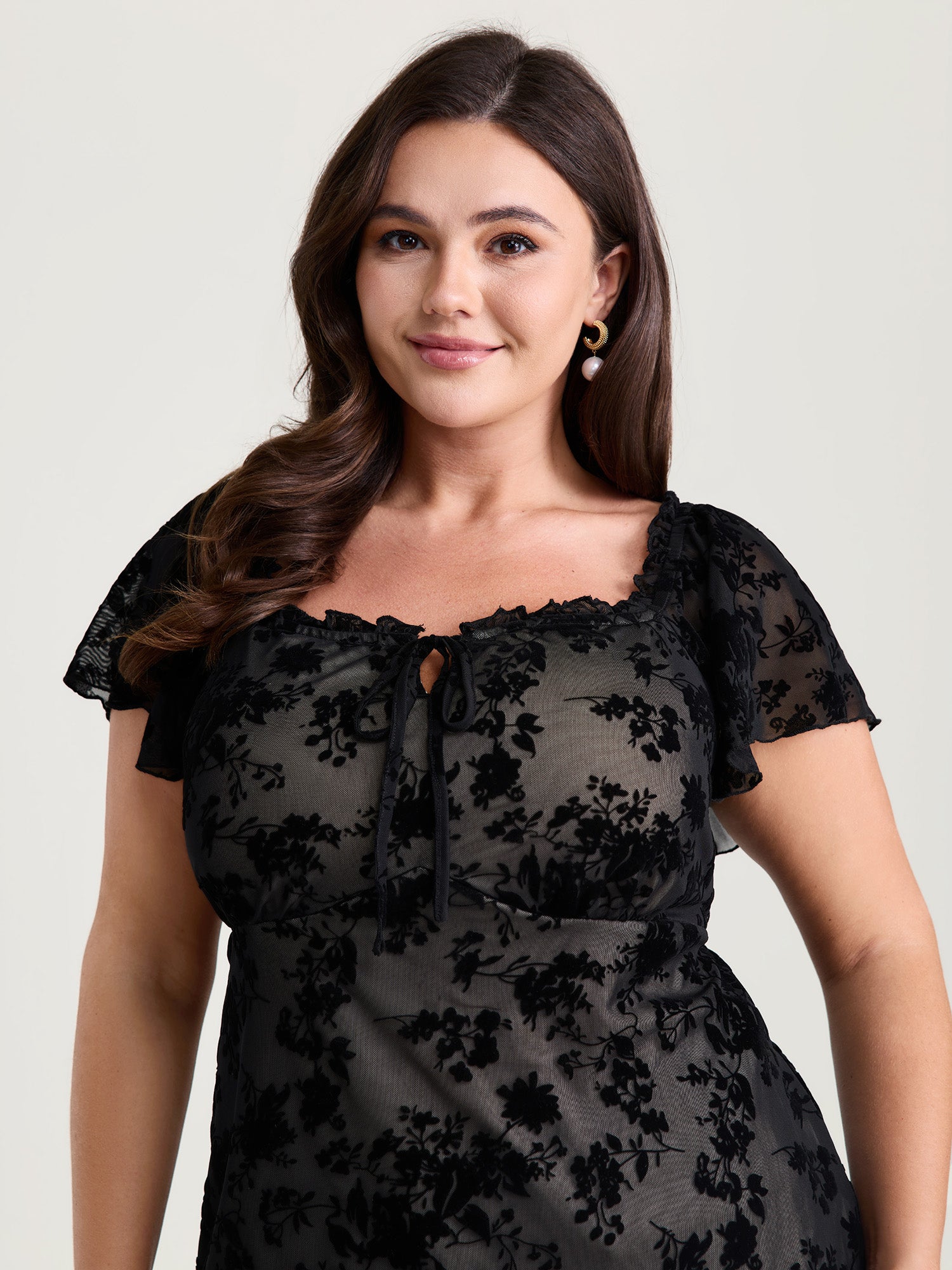 Flocked Floral Drawstring Neckline Knit Top