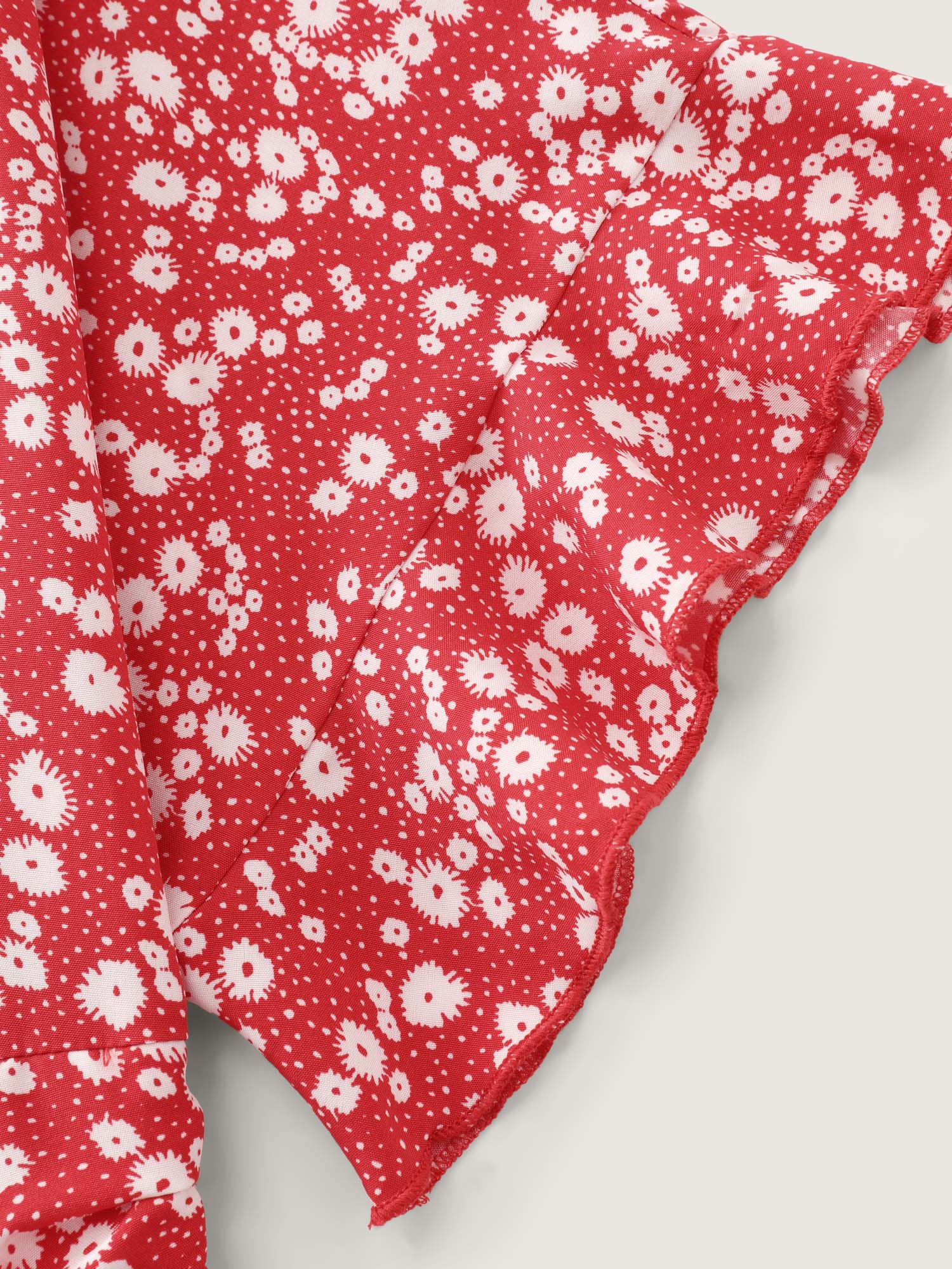 Ditsy Floral Print Ruffled Hem Jumpsuit